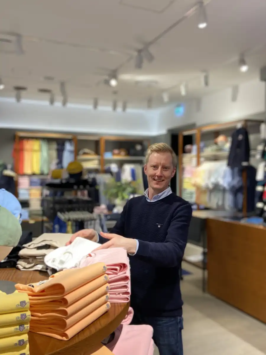 andreas-falkson-falk-standing-in-a-gant-store