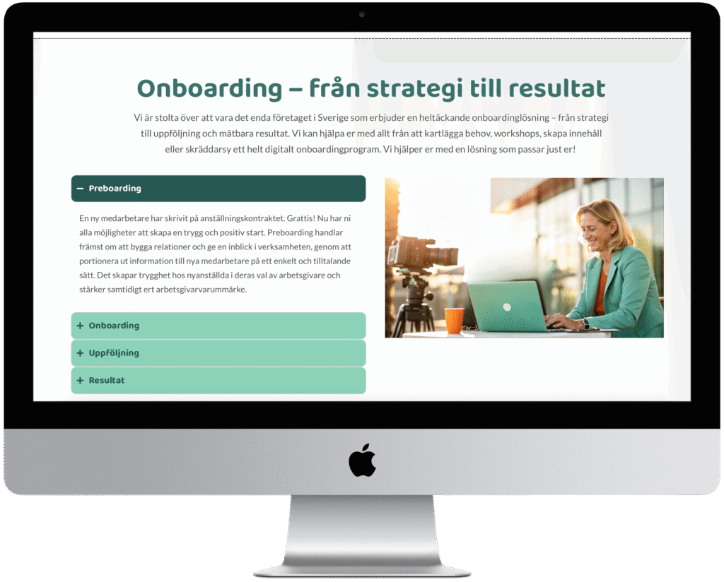 En iMac mockup som visar Onboarding sidan av Inductions nya hemsida.